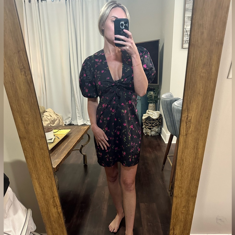 Pam & Gela black mini dress with neon flowers and tie key hole